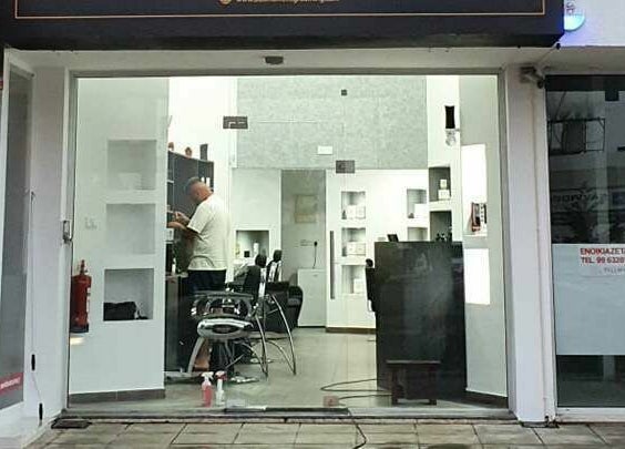 Front view of Udomo Barber and Nail Studio in Paphos, Paphos, CY, showing modern interior design.