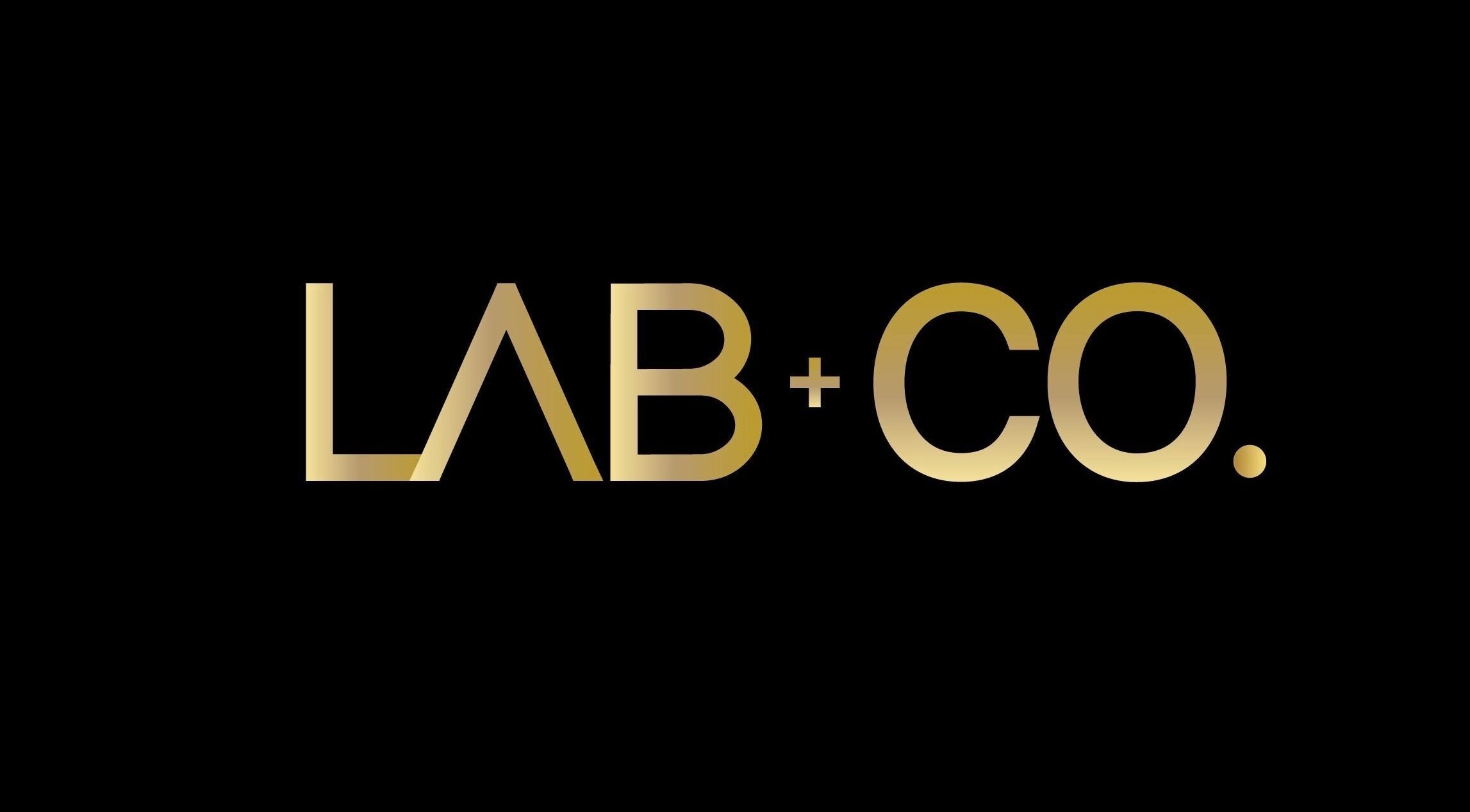 LAB + CO. logo in gold on black background, representing beauty and wellness in Melbourne, VIC, AU.