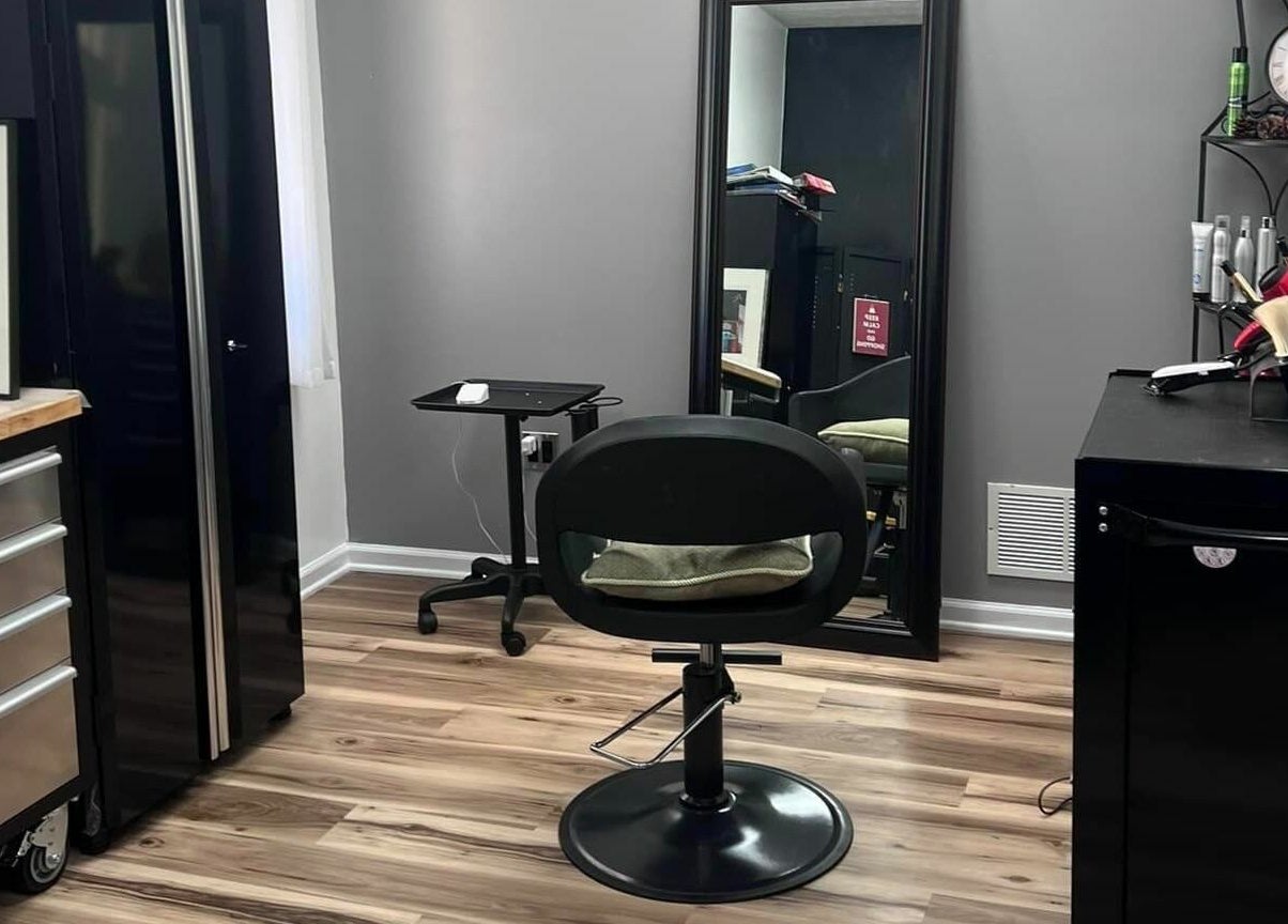 Salon interior at The Color Lab, Harrisonburg, Virginia, featuring a styling chair and elegant decor.