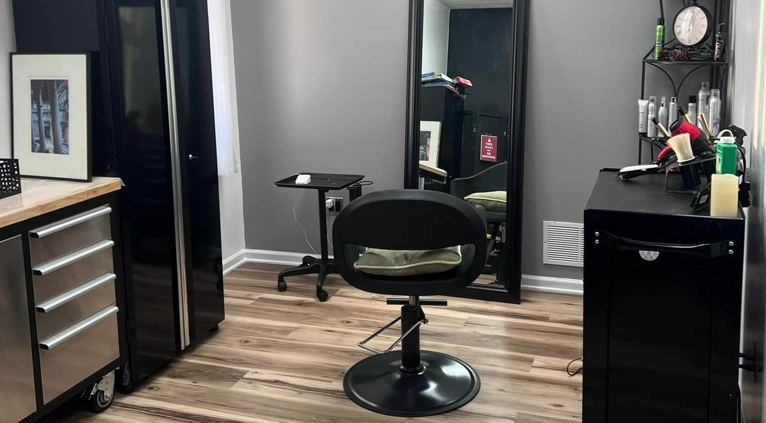 Salon interior at The Color Lab, Harrisonburg, Virginia, featuring a styling chair and elegant decor.