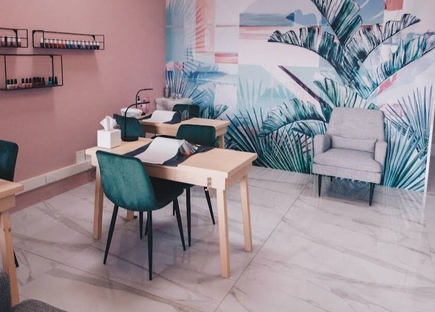 Relaxing manicure space at Mani & Chill, Habitat Centre, Cape Town, Western Cape, ZA with tropical decor.