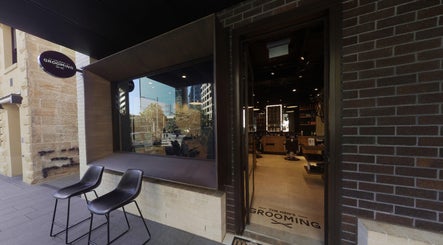 Entrance of The Mens Grooming - Quay Quarter in Sydney, New South Wales, AU, showcasing chic urban design.