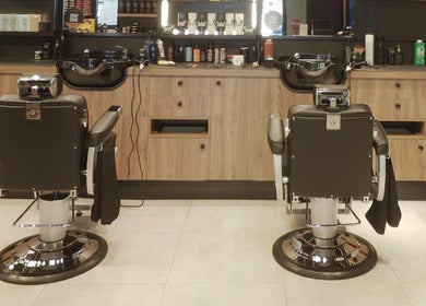 Elegant barber chairs at The Mens Grooming - Quay Quarter, Sydney, New South Wales, AU.