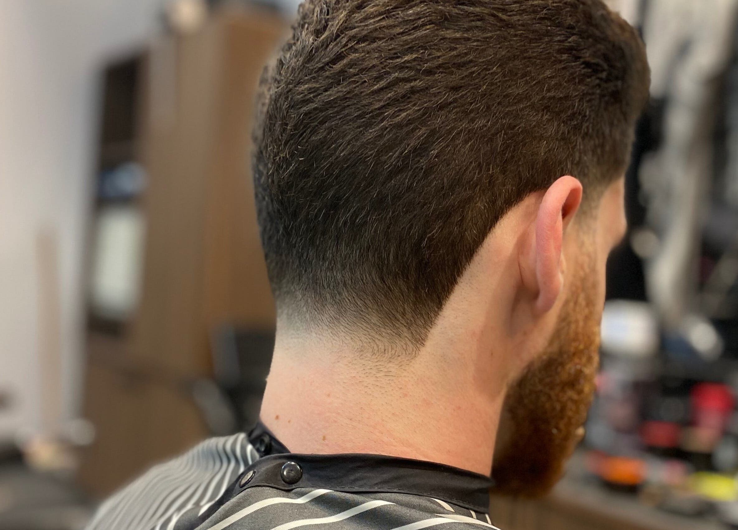 Close-up of a fresh haircut at The Men's Grooming Circular Quay Gateway, Sydney, New South Wales, AU.