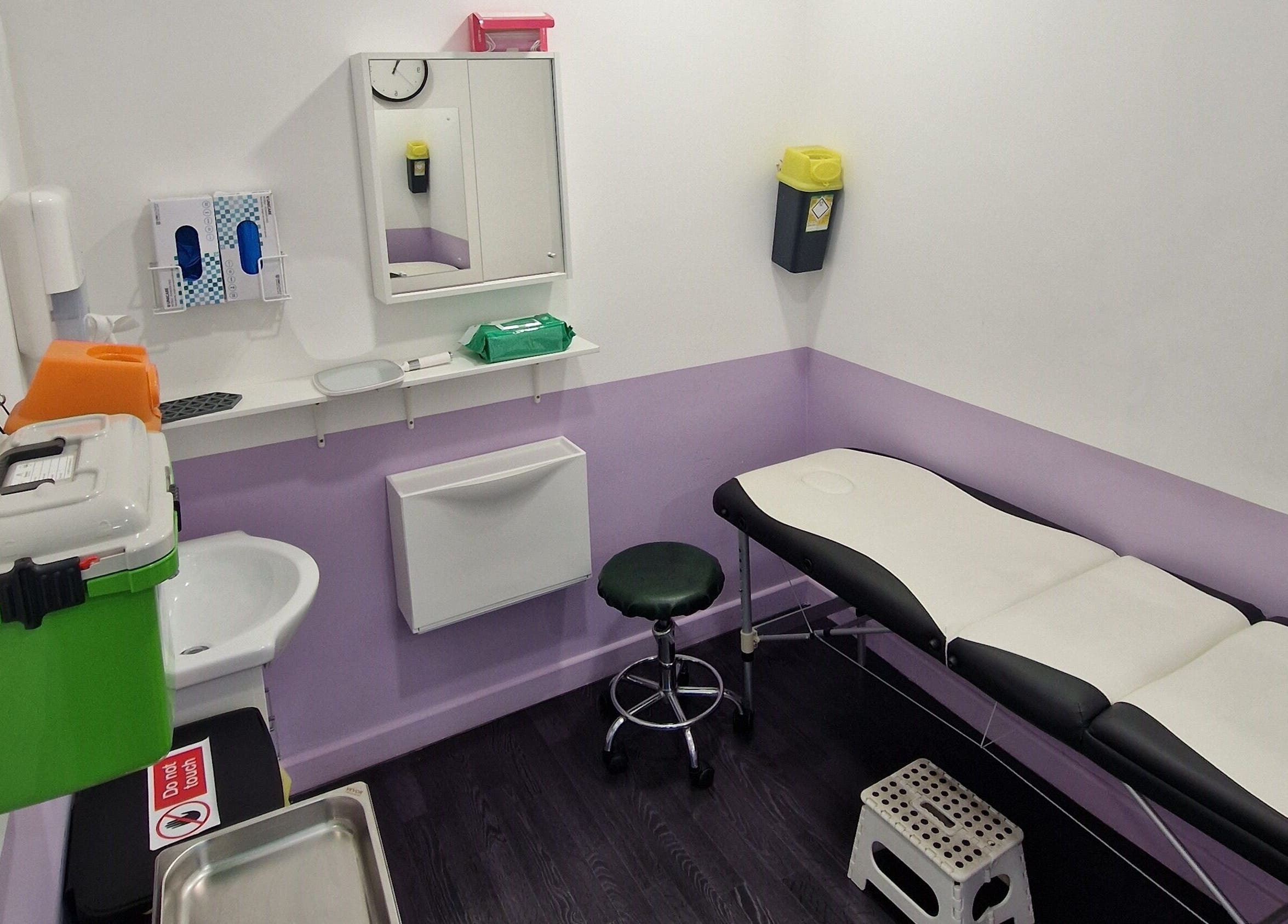 Clean and serene piercing room at Forest Piercing in Glasgow, Scotland, GB, featuring a modern setup.