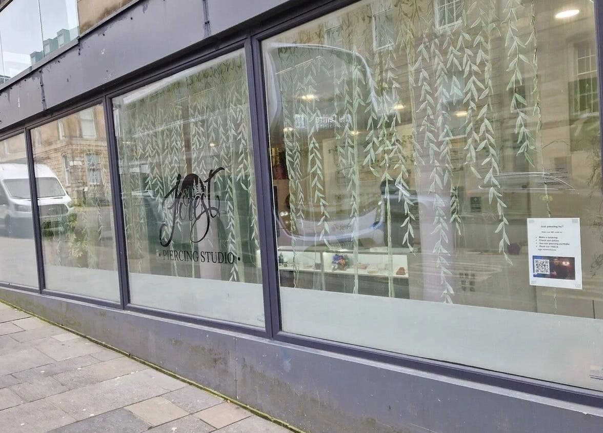 Exterior view of Forest Piercing in Glasgow, Scotland, GB showcasing a stylish window display.