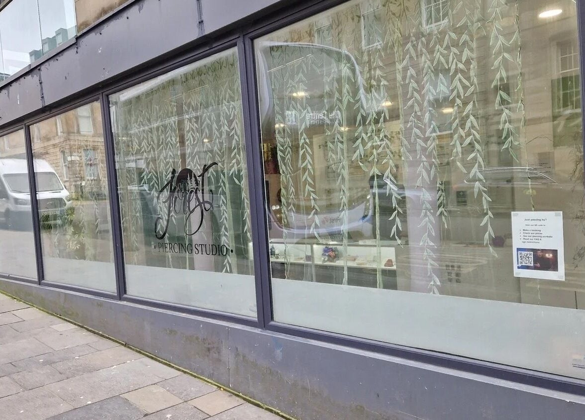 Exterior view of Forest Piercing in Glasgow, Scotland, GB showcasing a stylish window display.