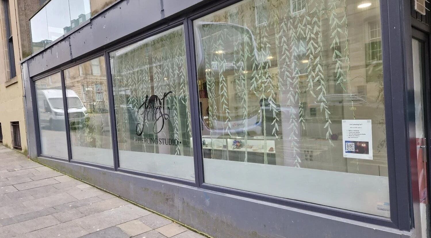 Exterior view of Forest Piercing in Glasgow, Scotland, GB showcasing a stylish window display.