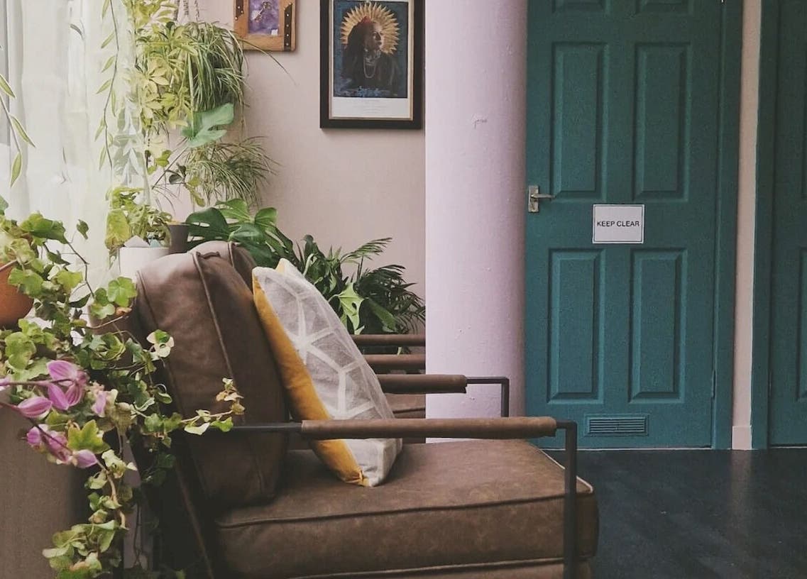 Relaxing interior with green plants at Forest Piercing in Glasgow, Scotland, GB.