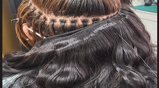 Hair extensions application at HairPlusTT, Port of Spain, Port of Spain Corporation, TT. Beautiful silky finish.