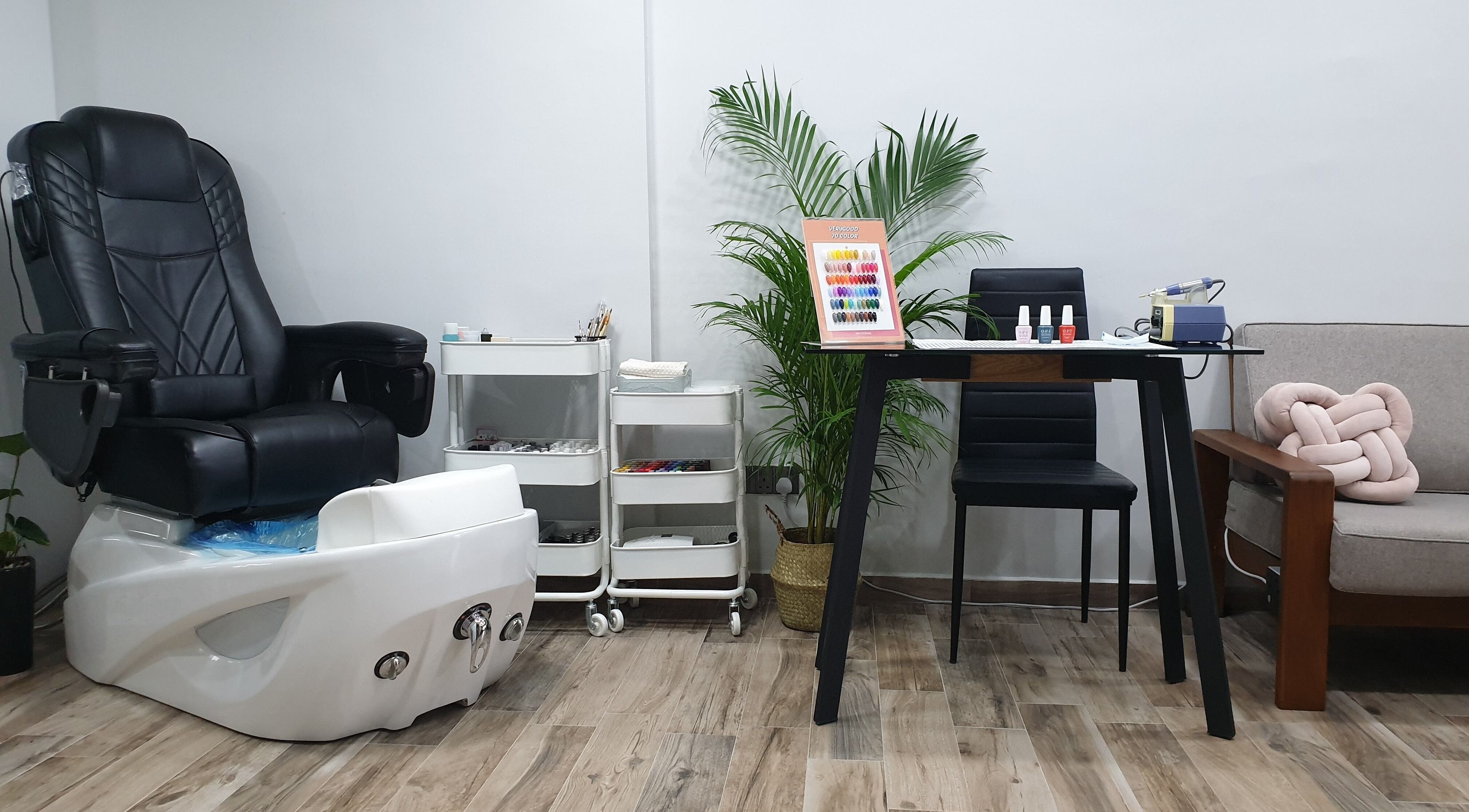 Relaxing pedicure station at Better Nails, Singapore, SG showcasing comfortable chair and nail equipment.