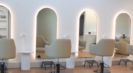 Modern salon chairs and illuminated mirrors at Hair by Jessie - Hervey Bay, Pialba, Queensland, AU.
