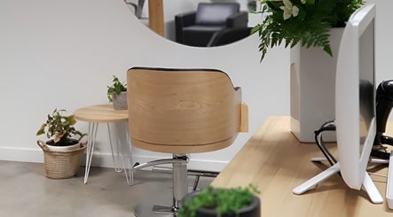 Modern salon chair at Charles St. Launceston Tasmania, showcasing minimalist style in Launceston, Tasmania, AU.
