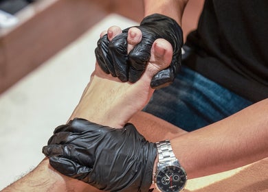 Expert foot massage at The Lair Man, Mumbai, Maharashtra, IN, showing relaxation and professional care.