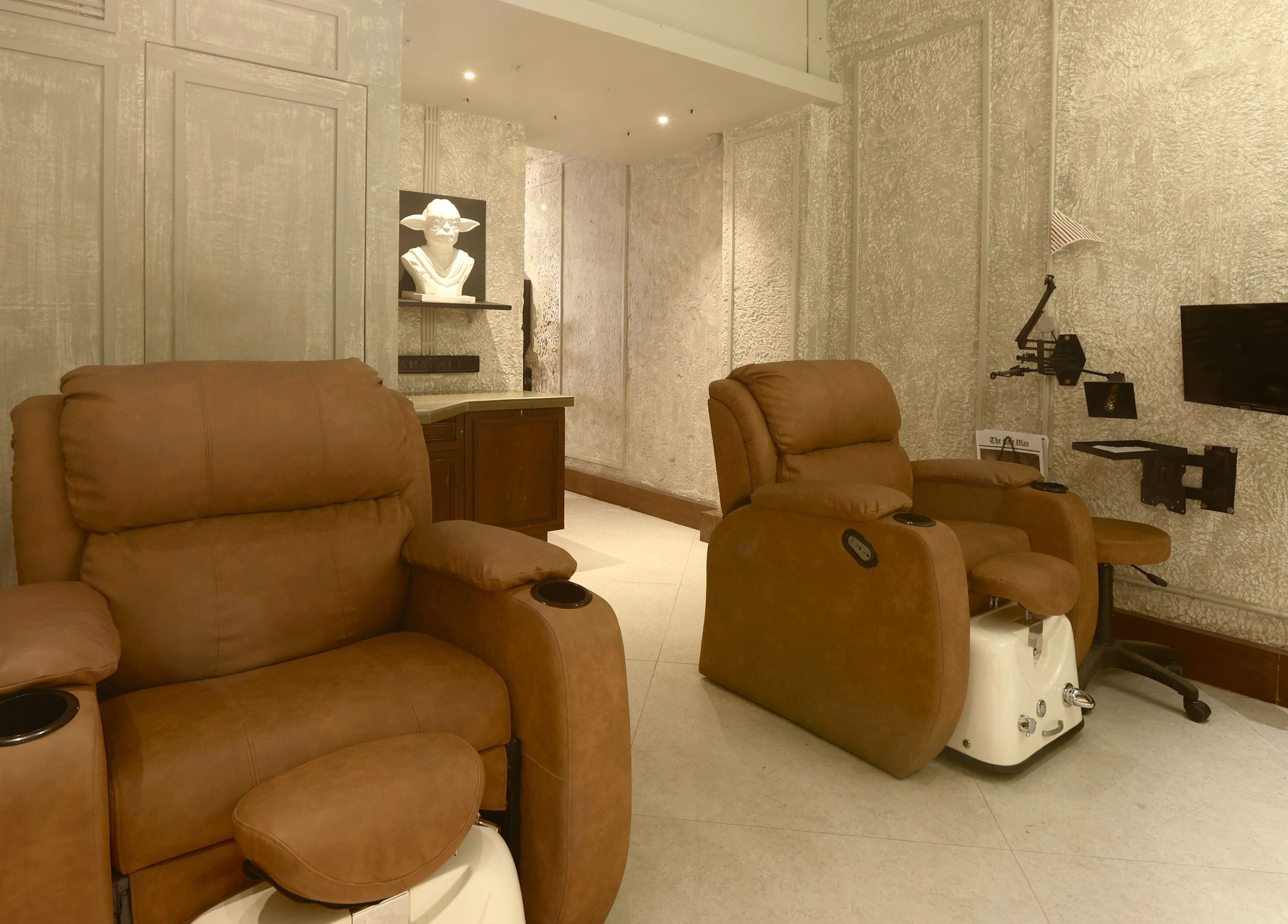 Luxurious spa recliners at The Lair Man, Mumbai, Maharashtra, IN, in a comfortable and elegant setting.
