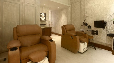 Luxurious spa recliners at The Lair Man, Mumbai, Maharashtra, IN, in a comfortable and elegant setting.
