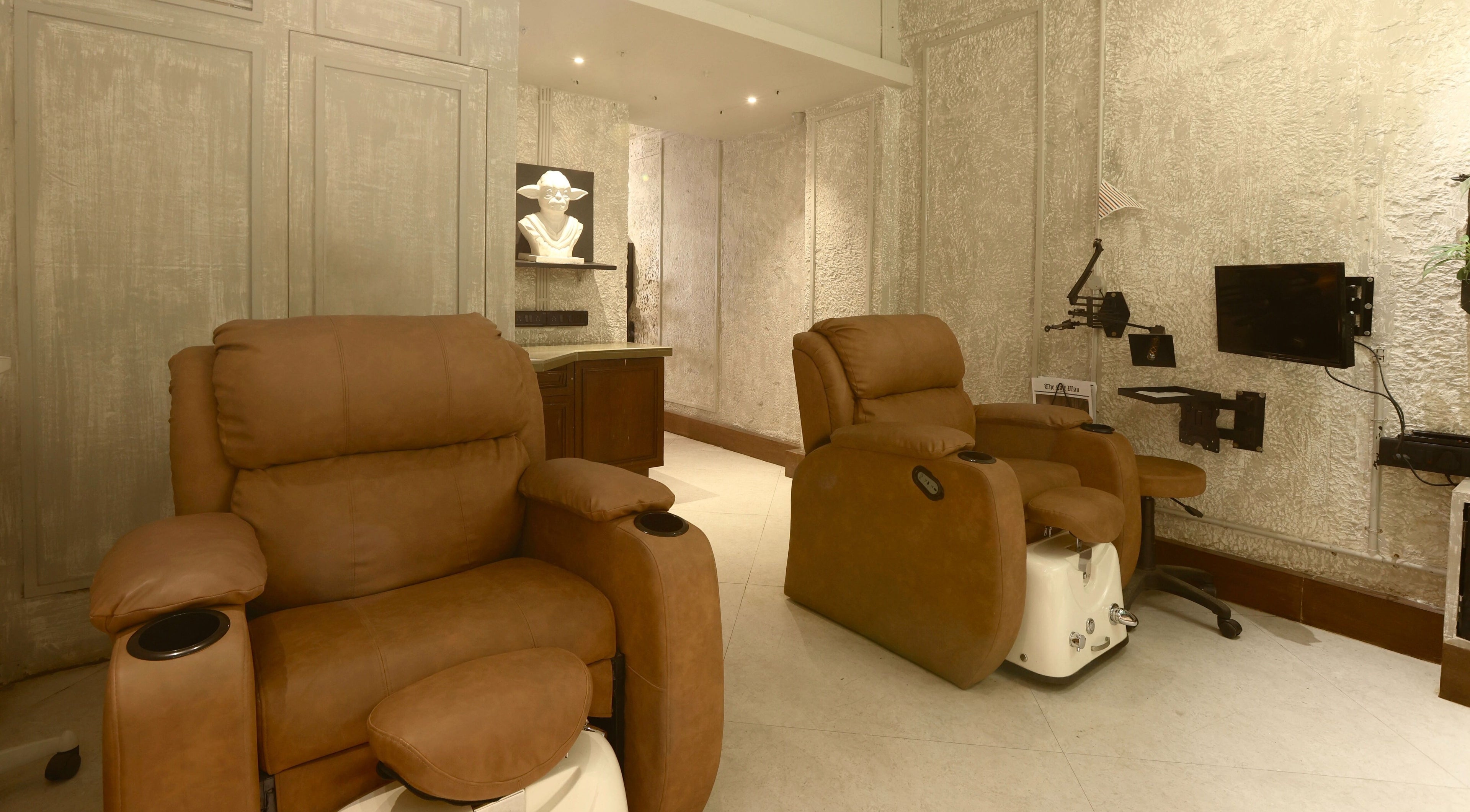 Luxurious spa recliners at The Lair Man, Mumbai, Maharashtra, IN, in a comfortable and elegant setting.