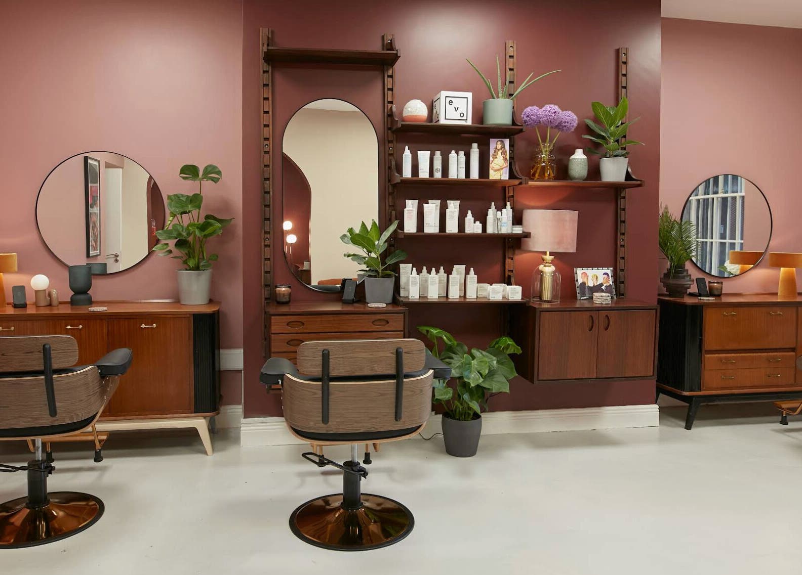 Elegant salon setup at Aidan Darcy • Hair, Dublin 2, IE with vintage chairs and stylish decor.