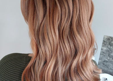 Flowing auburn hair at The Hair Lodge, Wakefield, England, GB. Perfectly styled with natural waves.