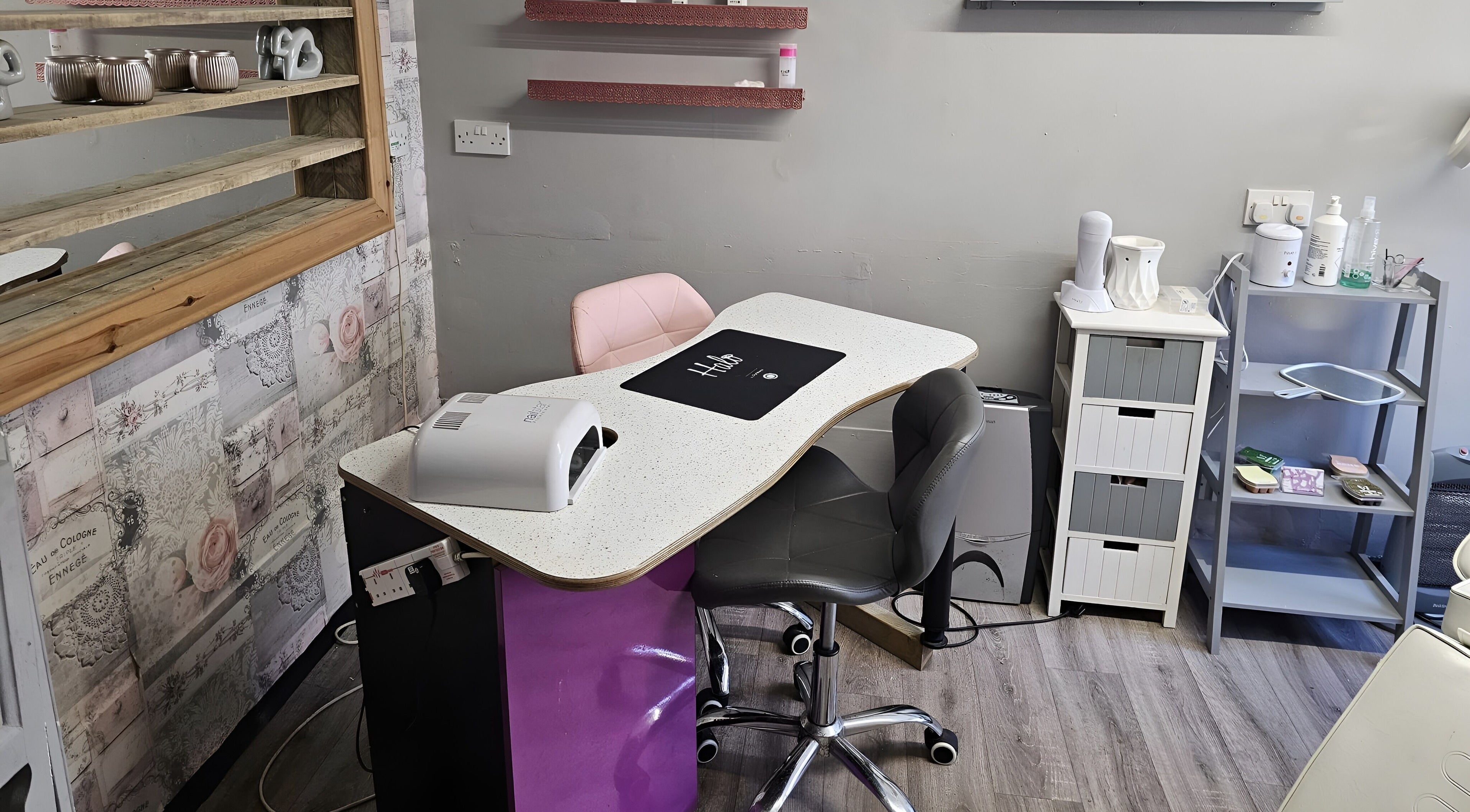 Modern nail station at Colour Chic in Redruth, England, GB showcasing elegant decor and manicure tools.