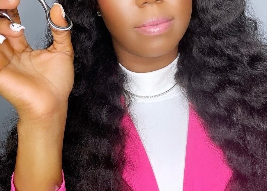 Stylist showcasing hair extensions at Diamond’s Beauty by Sherise, Melverton, Saint George, BB.