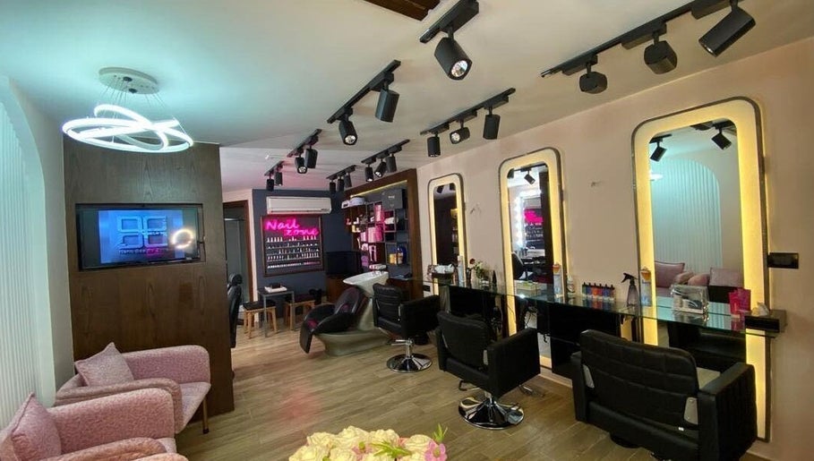 Interior of Nano Beauty Zone Salon, Damascus, SY featuring modern styling stations and elegant decor.
