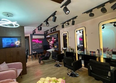 Interior of Nano Beauty Zone Salon, Damascus, SY featuring modern styling stations and elegant decor.