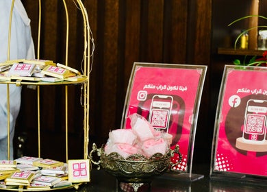 Nano Beauty Zone Salon in Damascus features a welcoming display with QR codes and complimentary treats.