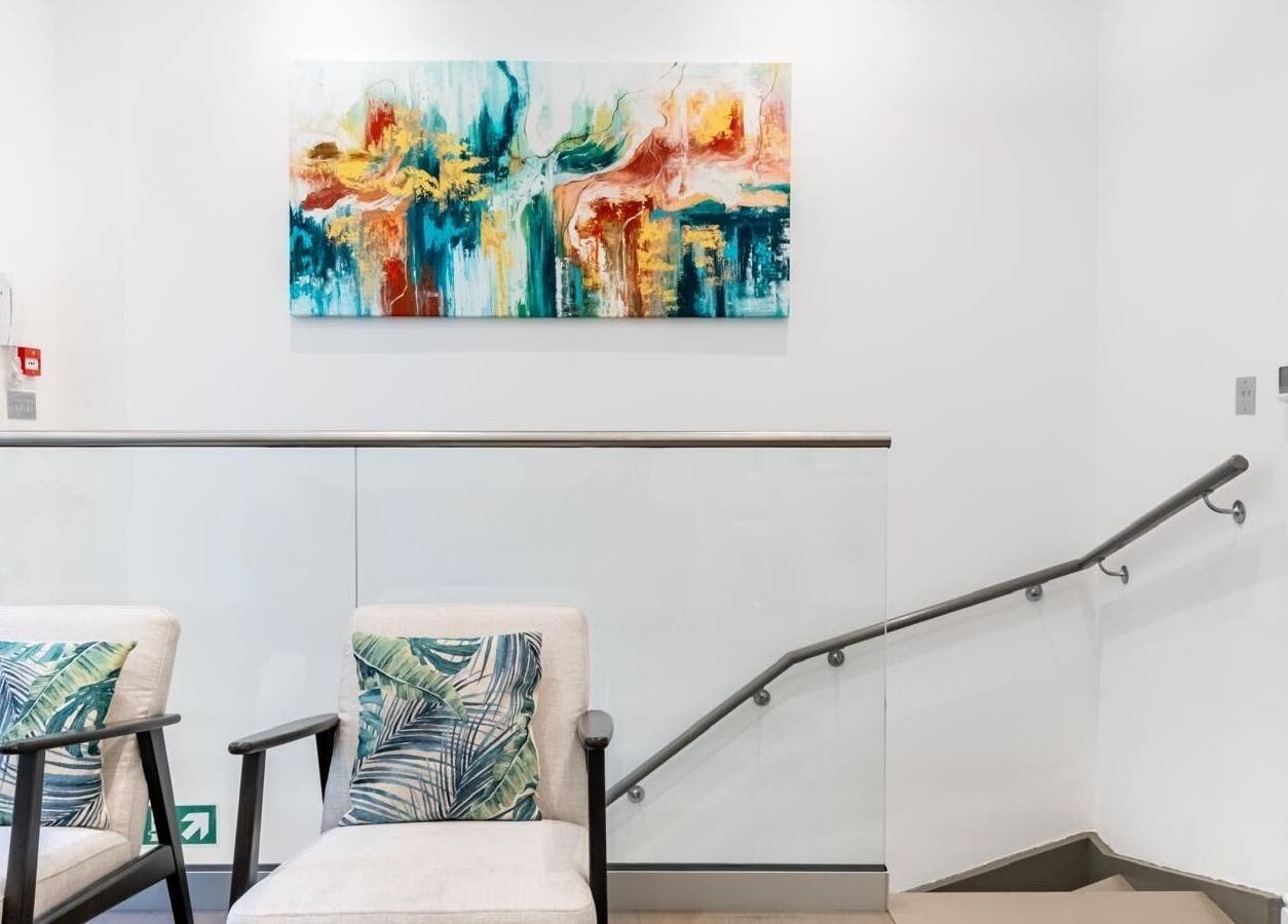Stylish lounge area at Waxing London Pro - Battersea, featuring modern art in London, England, GB.