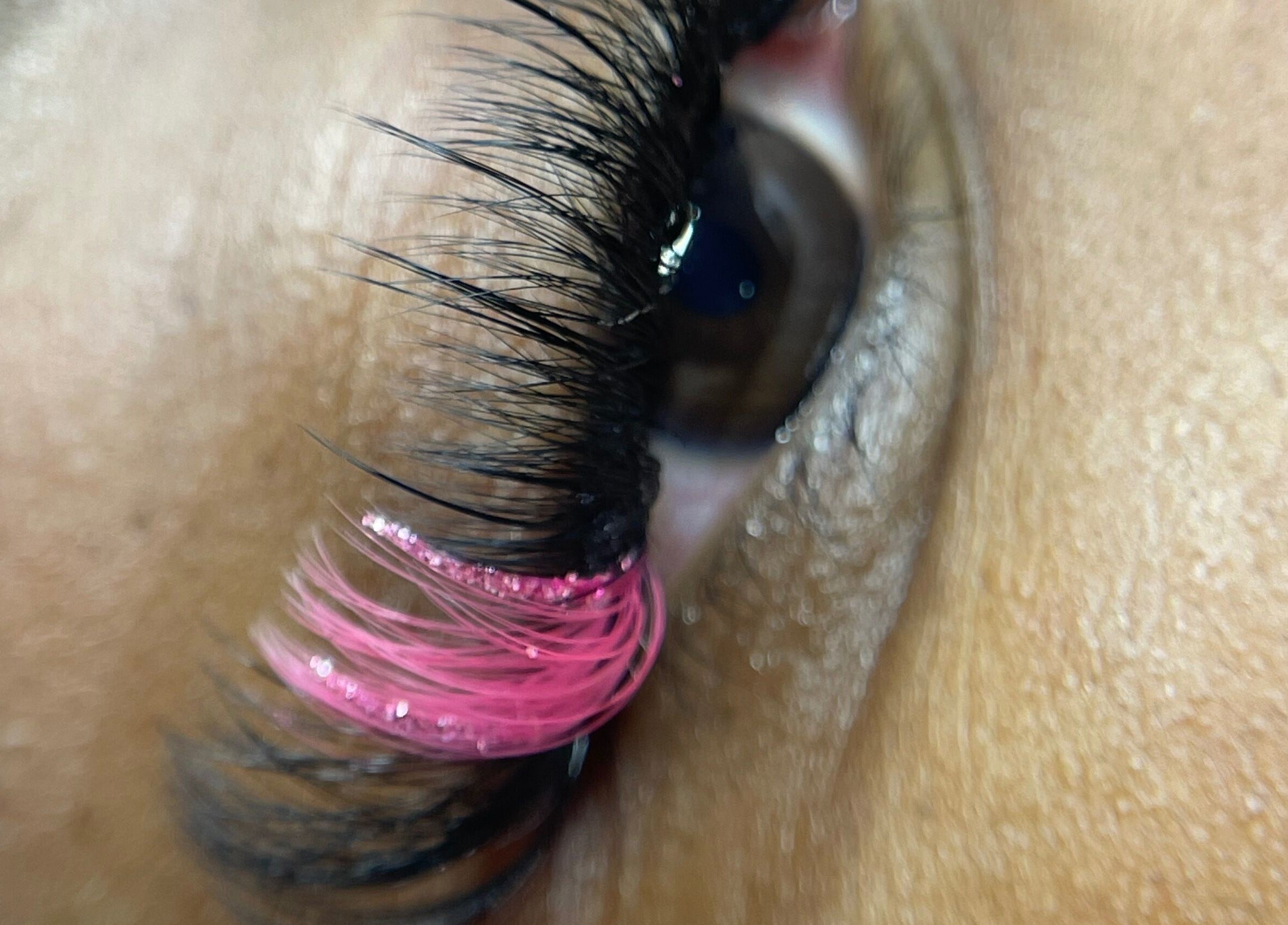 Close-up of eye with pink lash extension at Lashed by Lavern, London, England, GB.