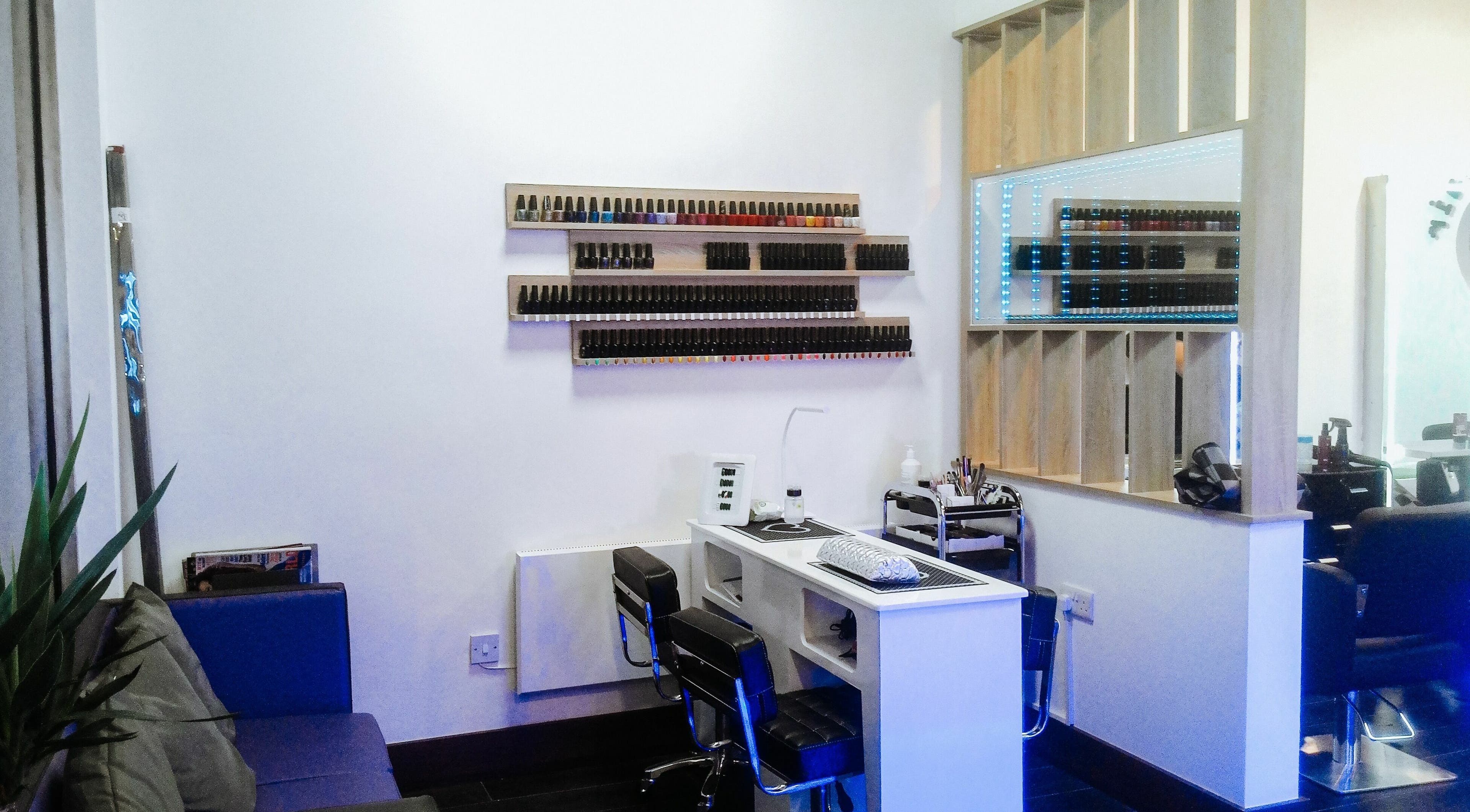 Modern nail station at Rick's Hair Workshop, Dublin, County Dublin, IE, showcasing sleek and organized setup.