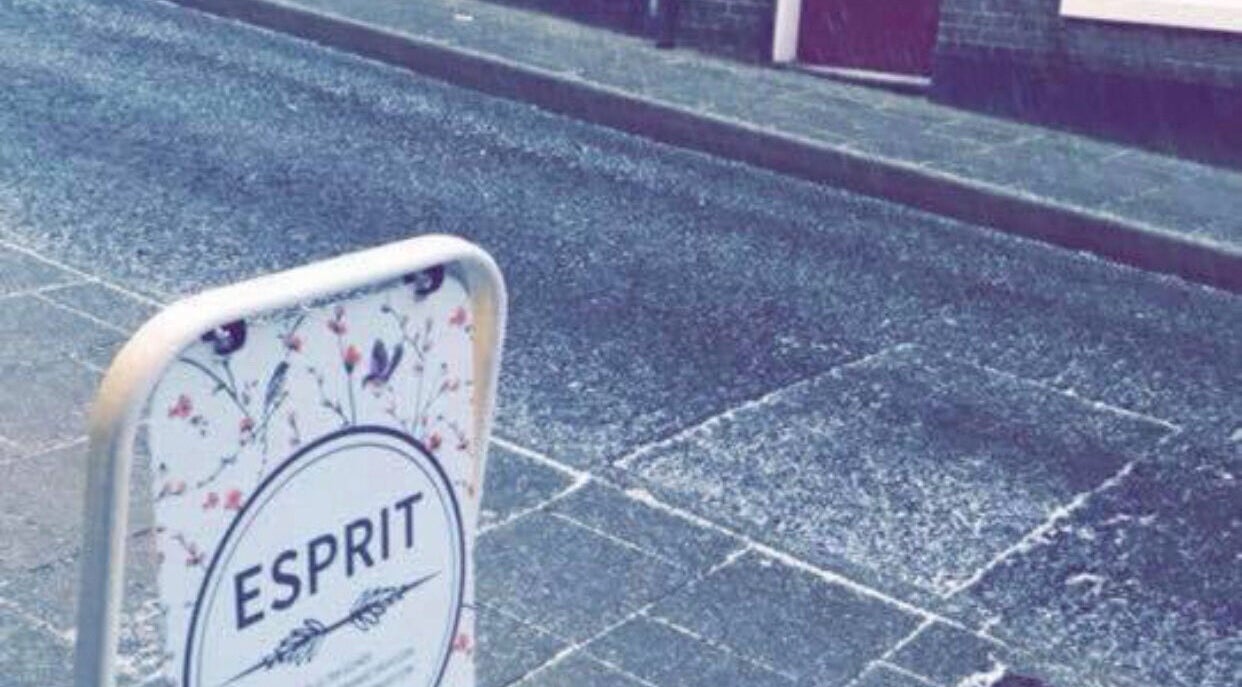 Street view of AmyLouise at Esprit Urban Retreat sign in Saffron Walden, England, GB showcasing floral design.