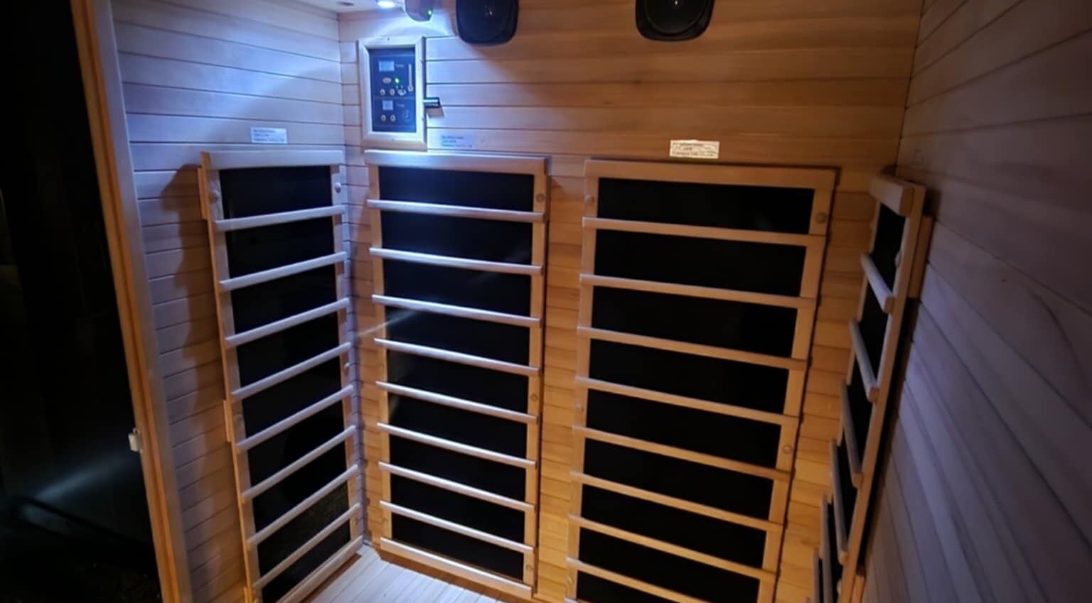 Relaxing sauna area at Classic Cuts Salon in Cresson, Pennsylvania, US showcasing a tranquil wooden design.