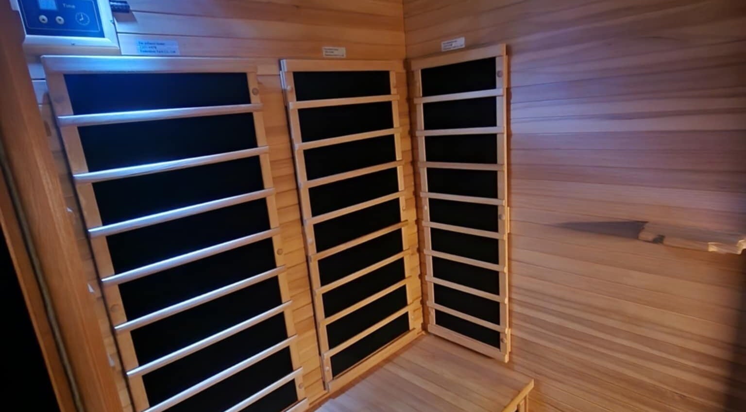 Interior of infrared sauna at Classic Cuts Salon in Cresson, Pennsylvania, US, offering a relaxing wellness experience.