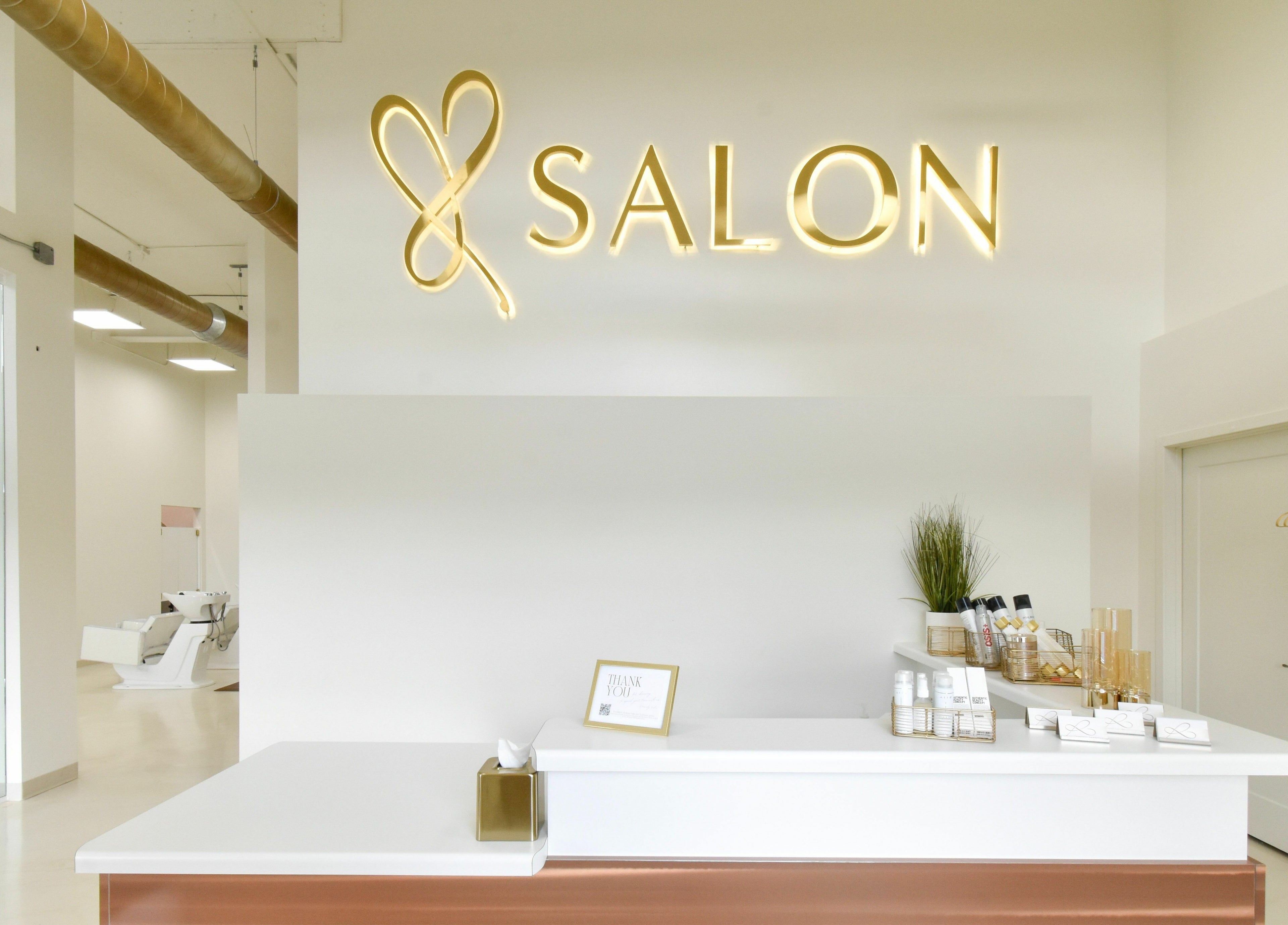 Elegant reception area at Remedy Salon in Appleton, Wisconsin, US with modern decor and stylish design.