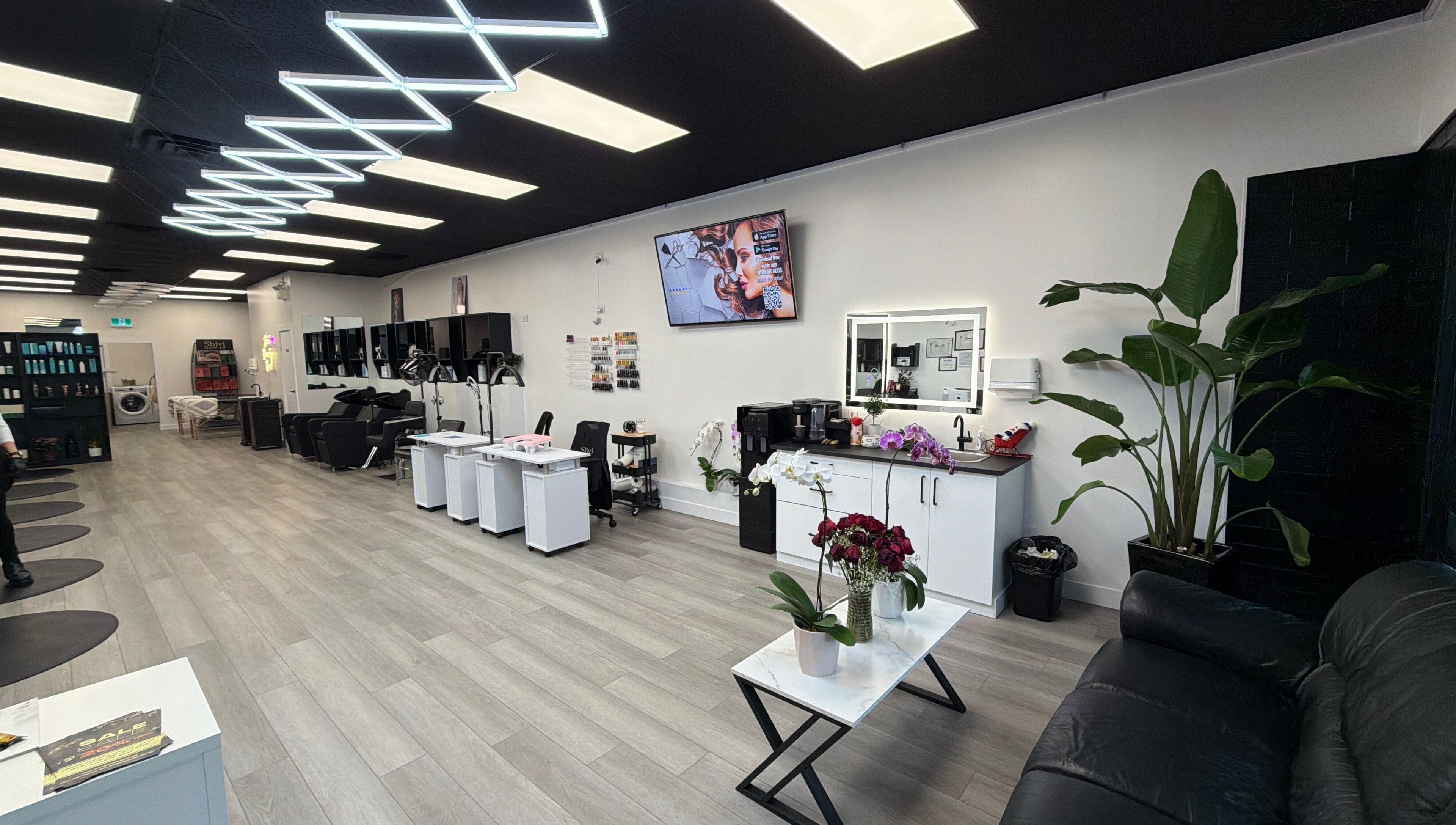 Modern interior of Shivilashes in Coquitlam, British Columbia, CA, featuring elegant salon chairs and stylish decor.