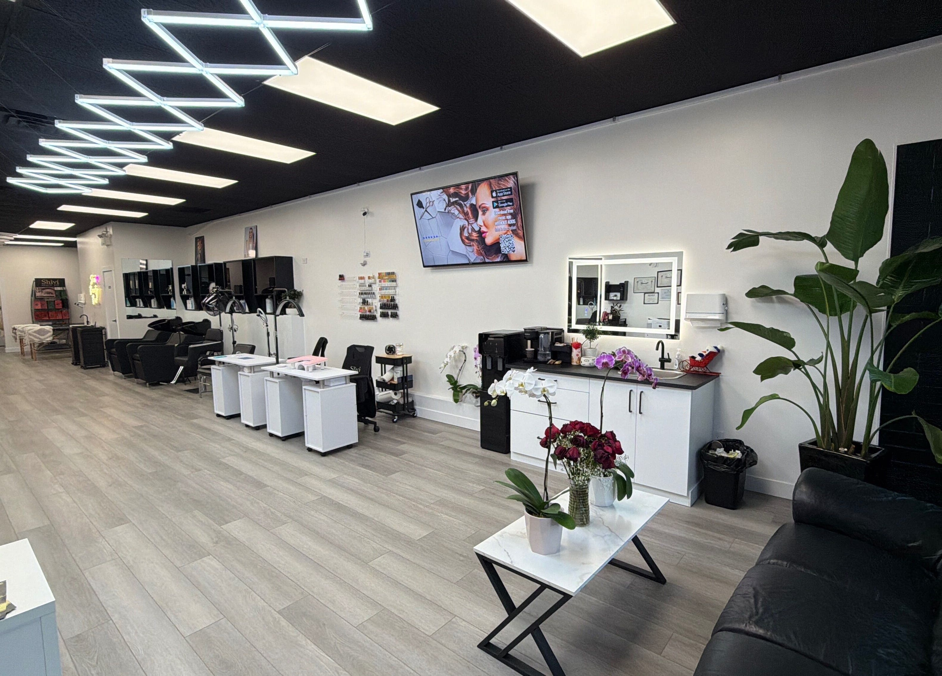 Modern interior of Shivilashes in Coquitlam, British Columbia, CA, featuring elegant salon chairs and stylish decor.