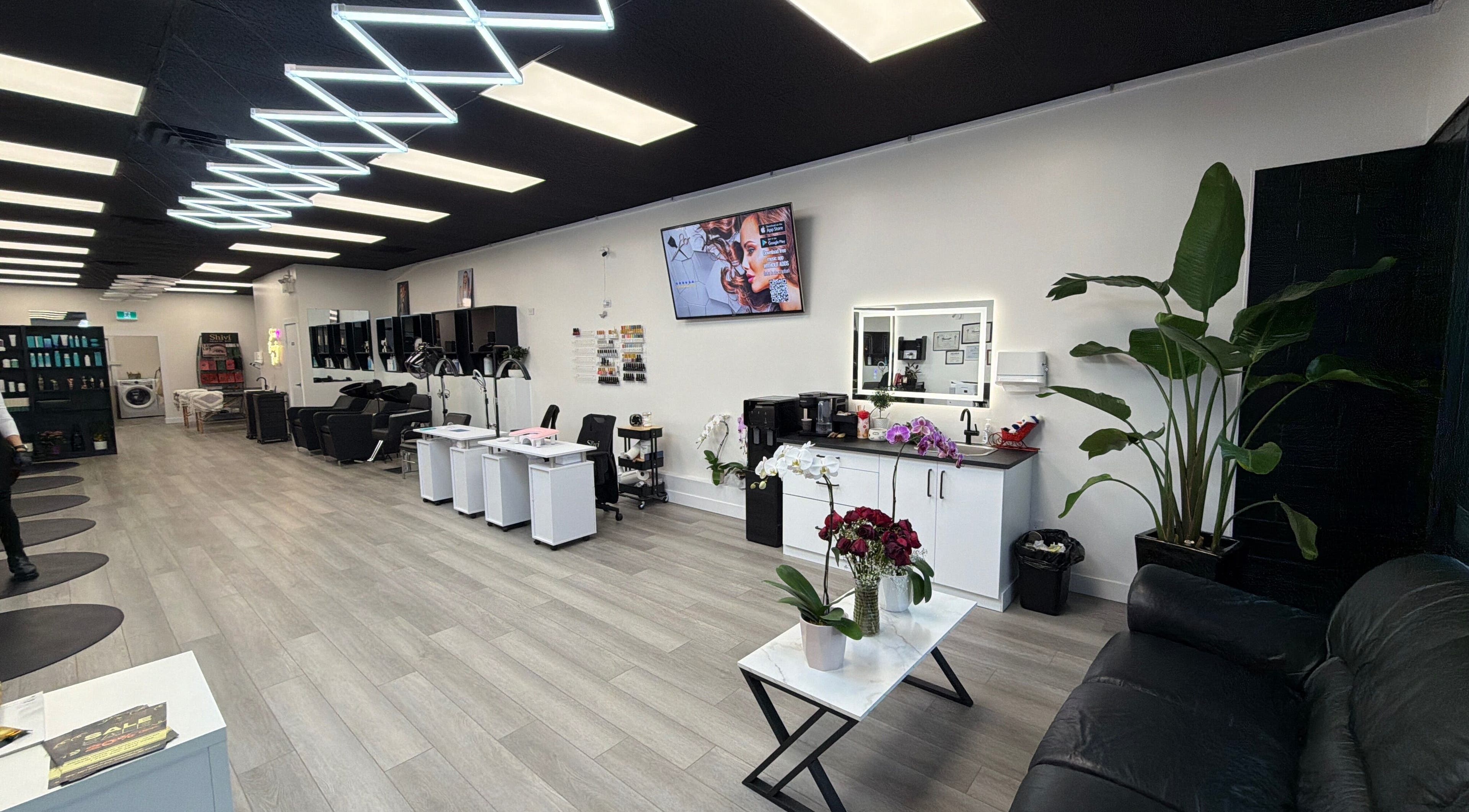 Modern interior of Shivilashes in Coquitlam, British Columbia, CA, featuring elegant salon chairs and stylish decor.