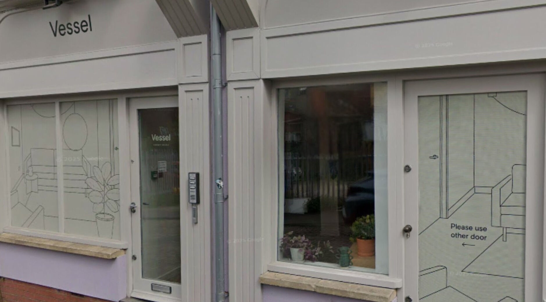 AmberLuna Apothecary's welcoming entrance in Bristol, England, GB, showcasing elegant exterior design.