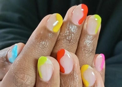 Colorful nail art at Abundance of Beauty, Birmingham, England, GB, showcasing vibrant and trendy designs.