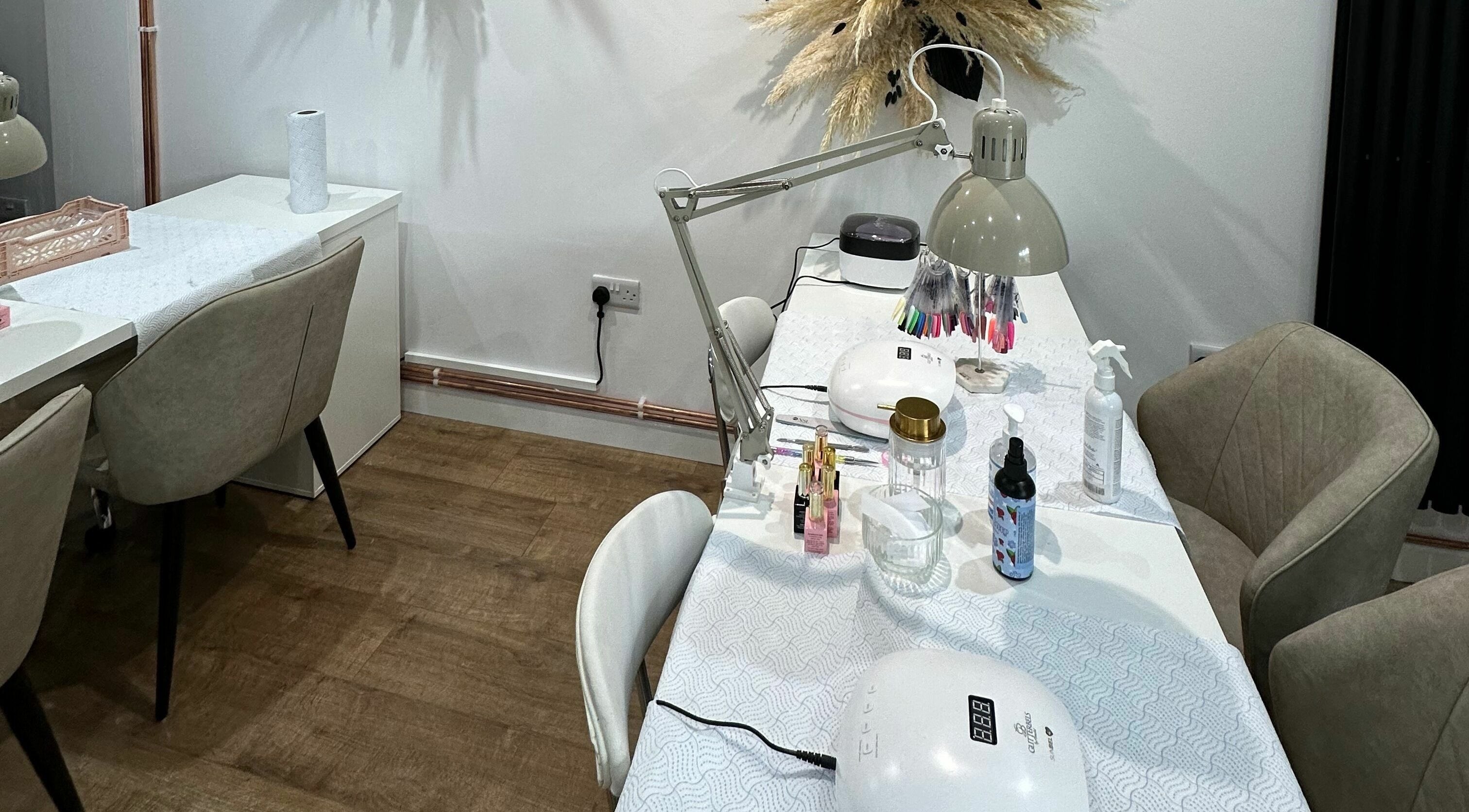 Elegant nail station at Nickies Salon & Academy, Musselburgh, Scotland, GB, featuring modern decor and tools.