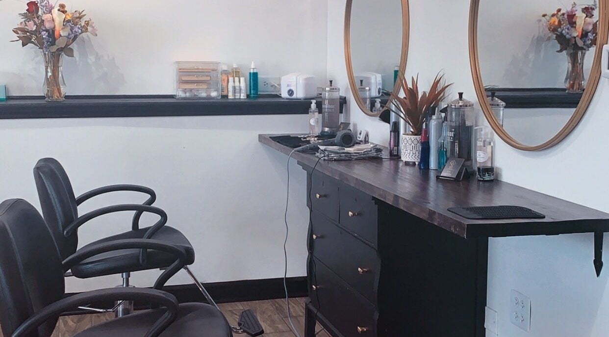 Chic salon interior at Allaur-Lauren Alyssa, Evergreen Park, Illinois, US, with stylish chairs and mirrors.