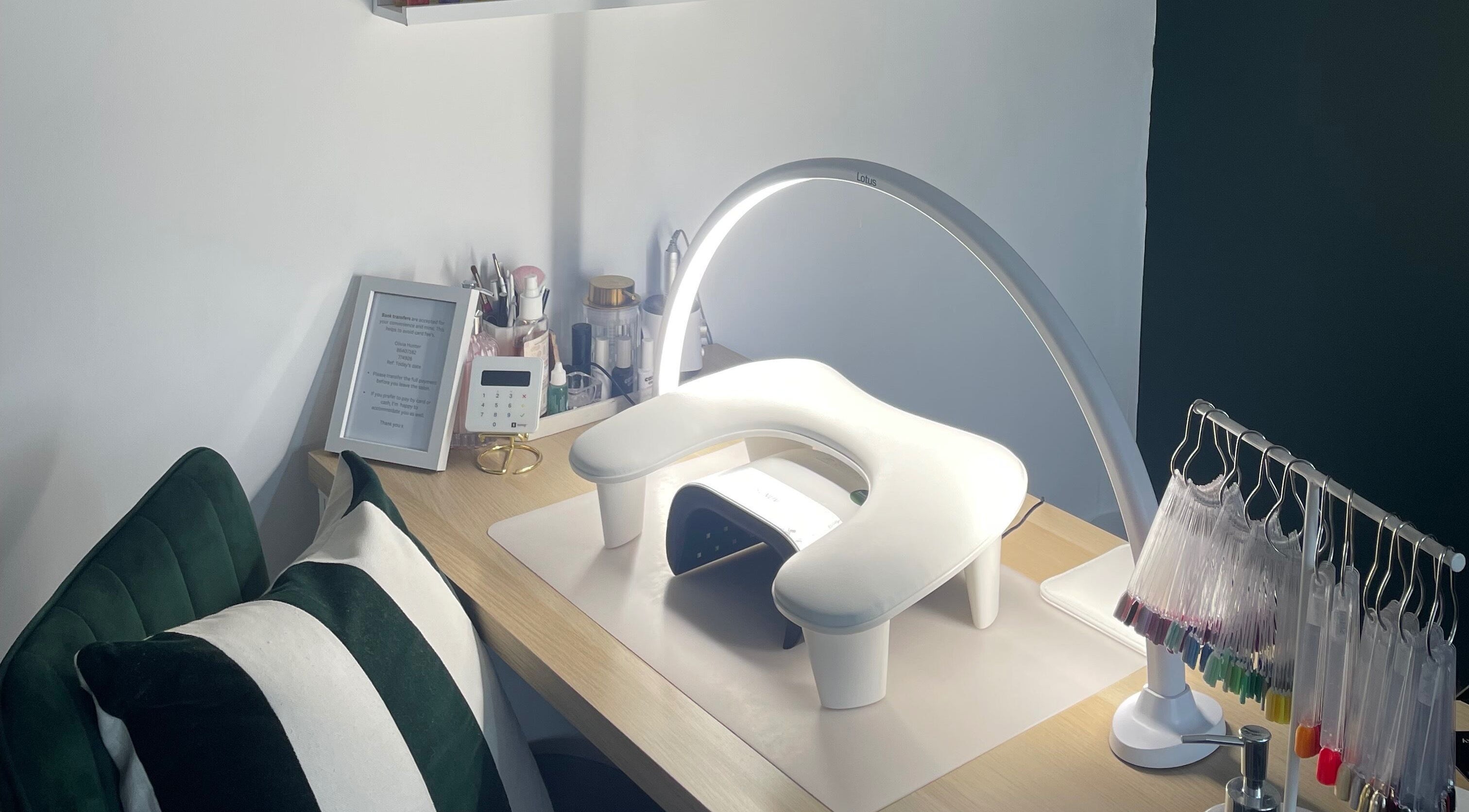 Elegant nail station at Beautology Newcastle, Whitley Bay, England, GB featuring manicure tools and cushions.