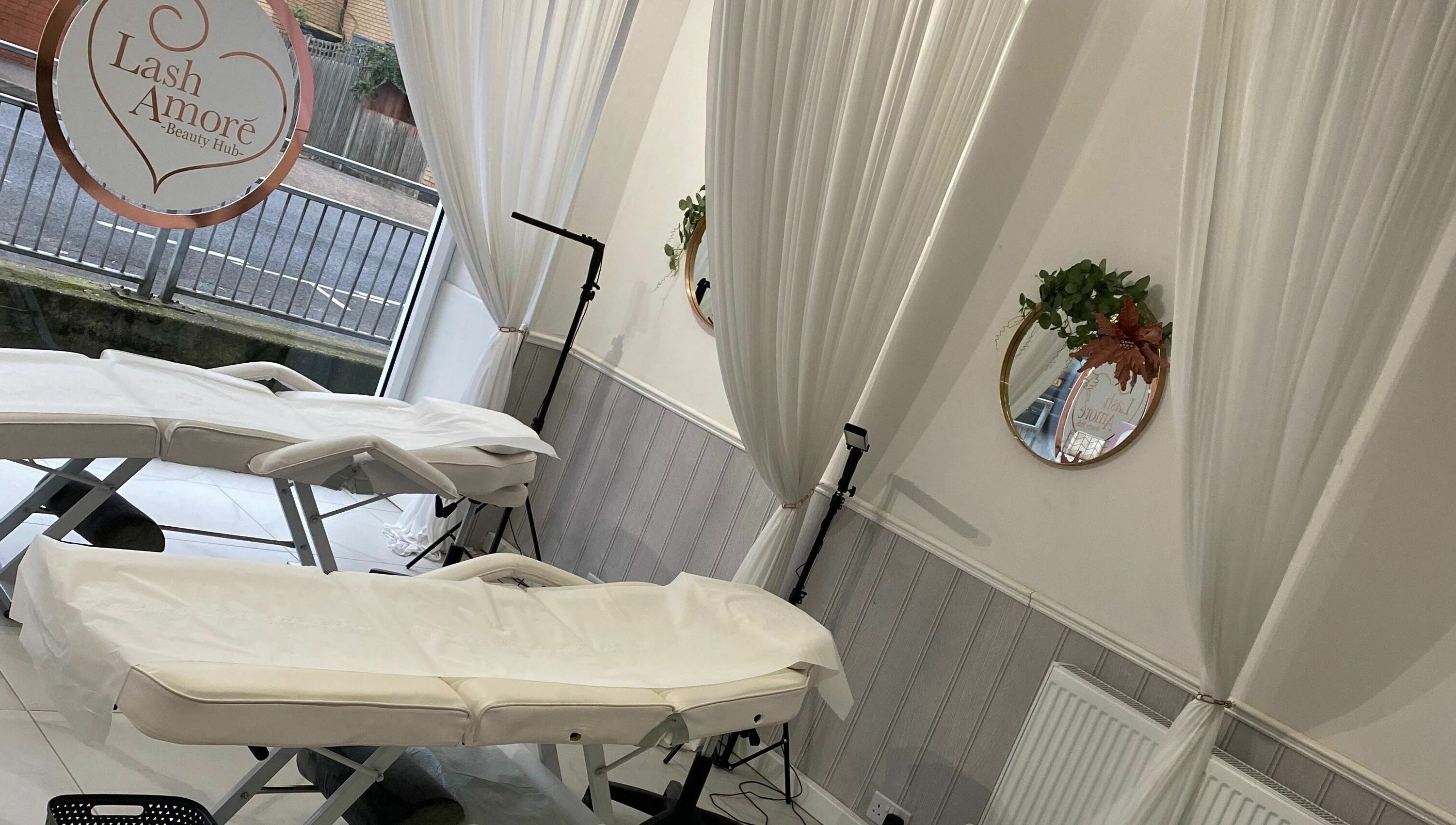 Lash Amoré Beauty Hub therapy room with elegant décor in West Drayton, England, GB.