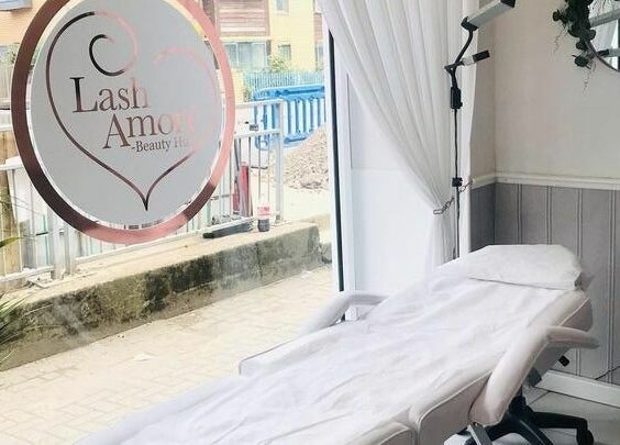 Inviting treatment room at Lash Amoré Beauty Hub in West Drayton, England, GB with comfortable massage bed.