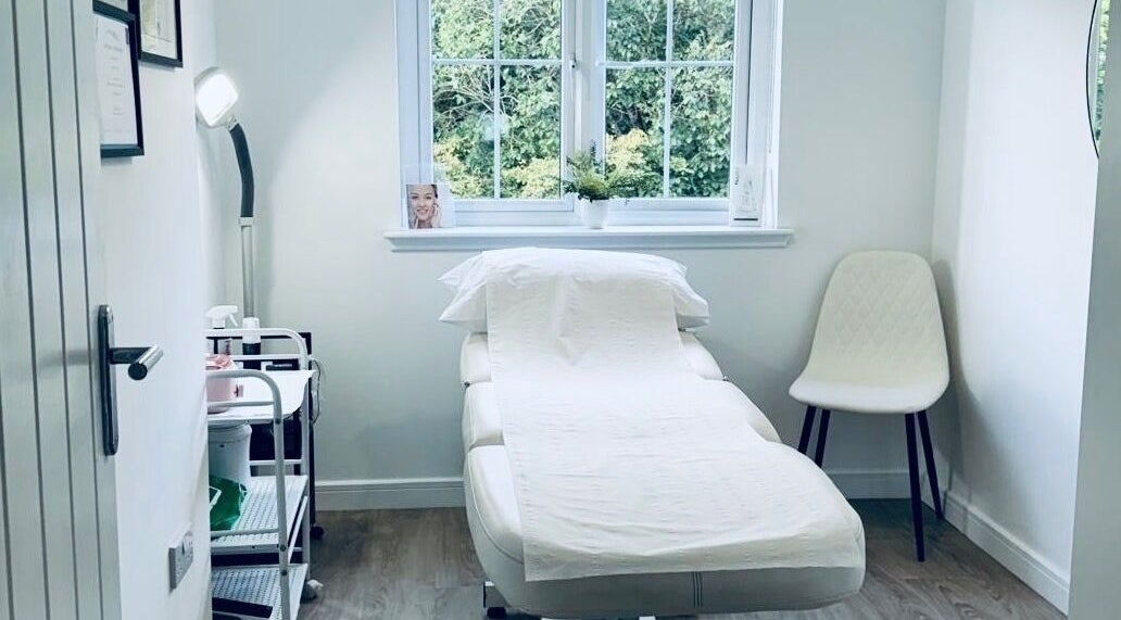 Tranquil treatment room at Beauty At 14, Livingston, Scotland, GB, featuring a comfortable therapy bed.