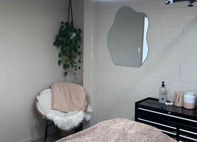 Relaxing corner at Frankie & me, Kihikihi, Waikato, NZ with chair, mirror, and plants.
