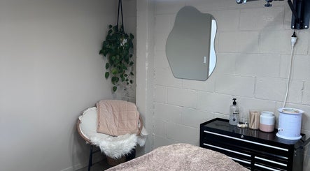 Relaxing corner at Frankie & me, Kihikihi, Waikato, NZ with chair, mirror, and plants.