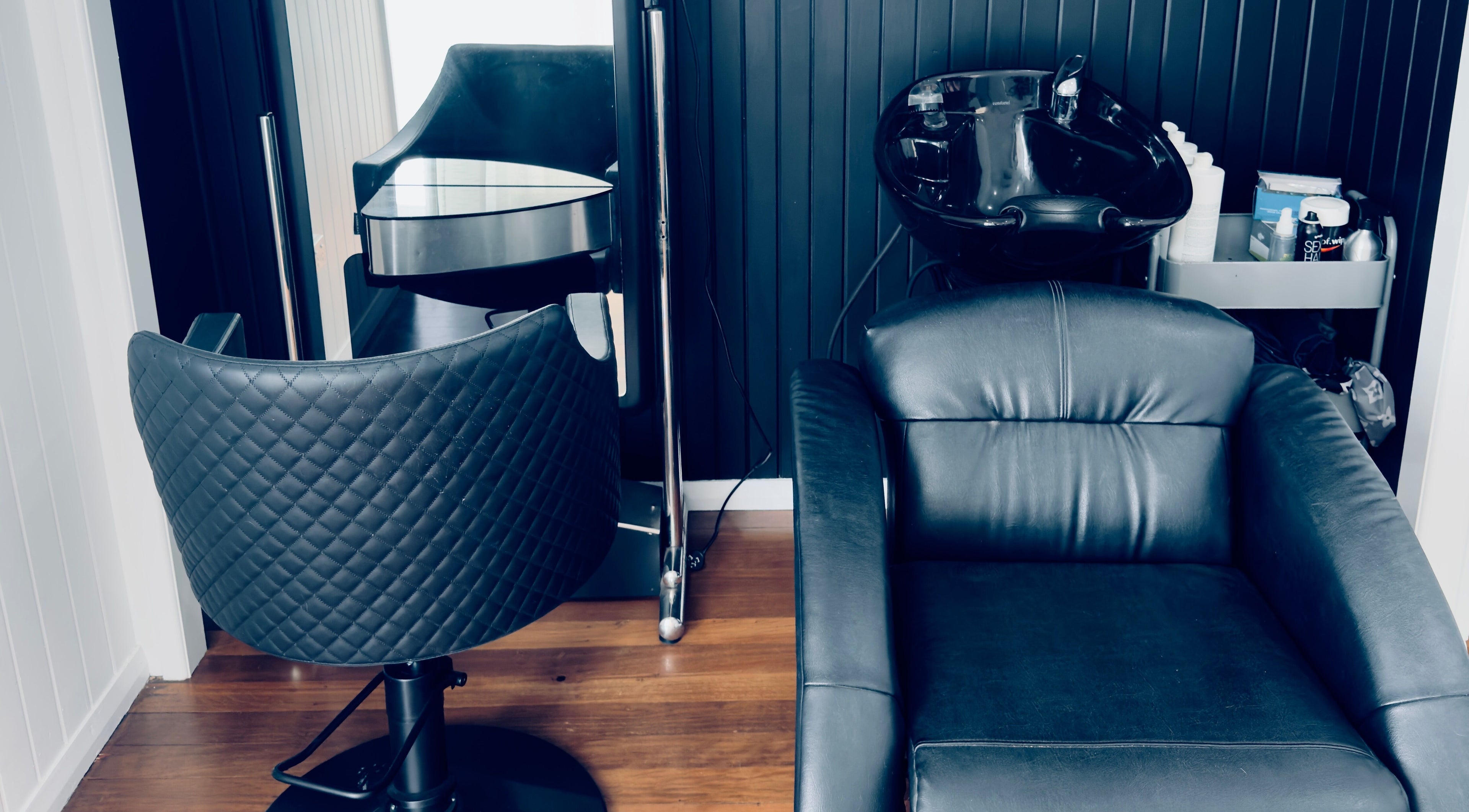 Elegant salon chairs at Finessed By Cloe, Berserker, Queensland, AU showcasing luxury comfort.
