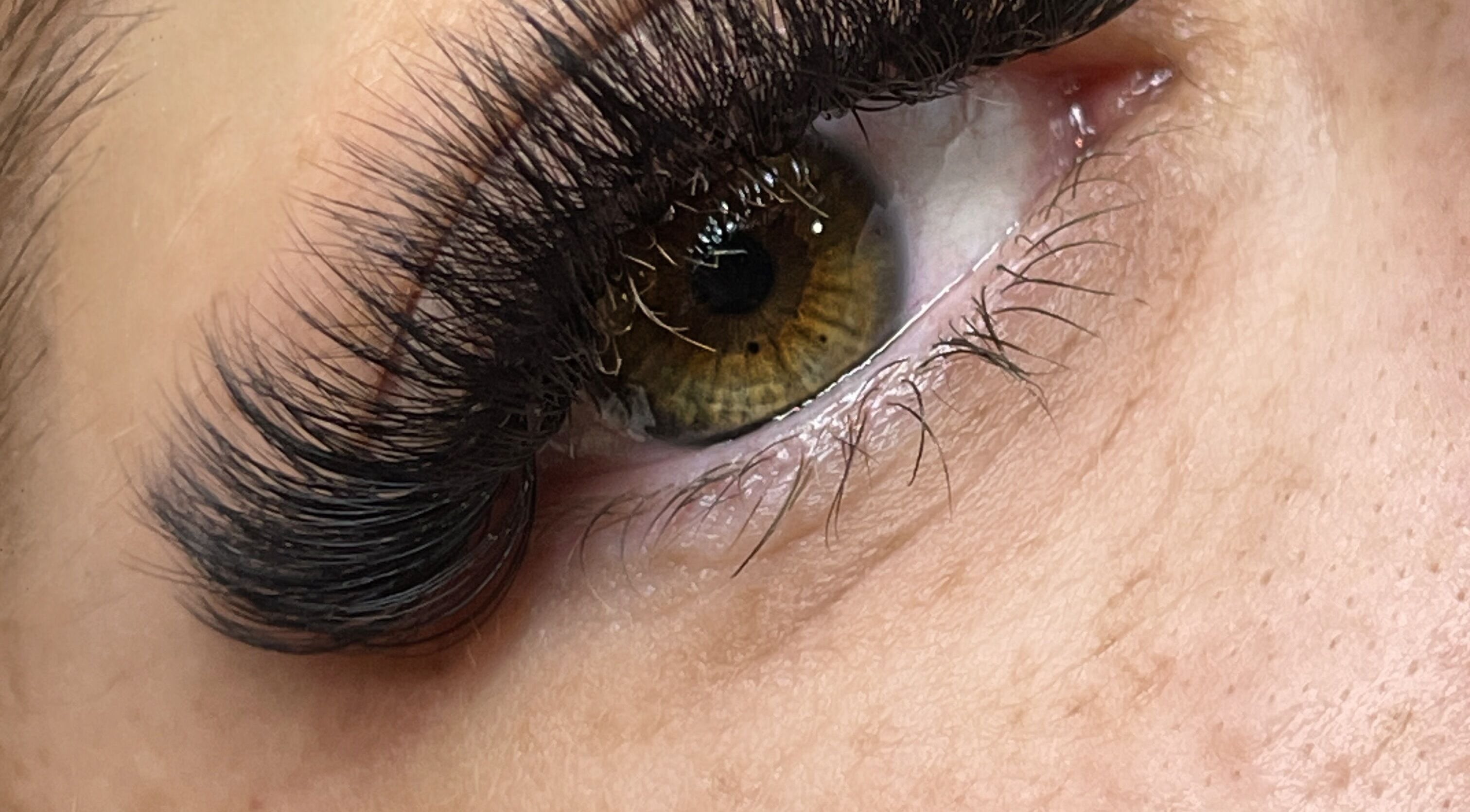 Close-up of eyelash extensions at Finessed By Cloe, Berserker, Queensland, AU, showcasing detailed craftsmanship.